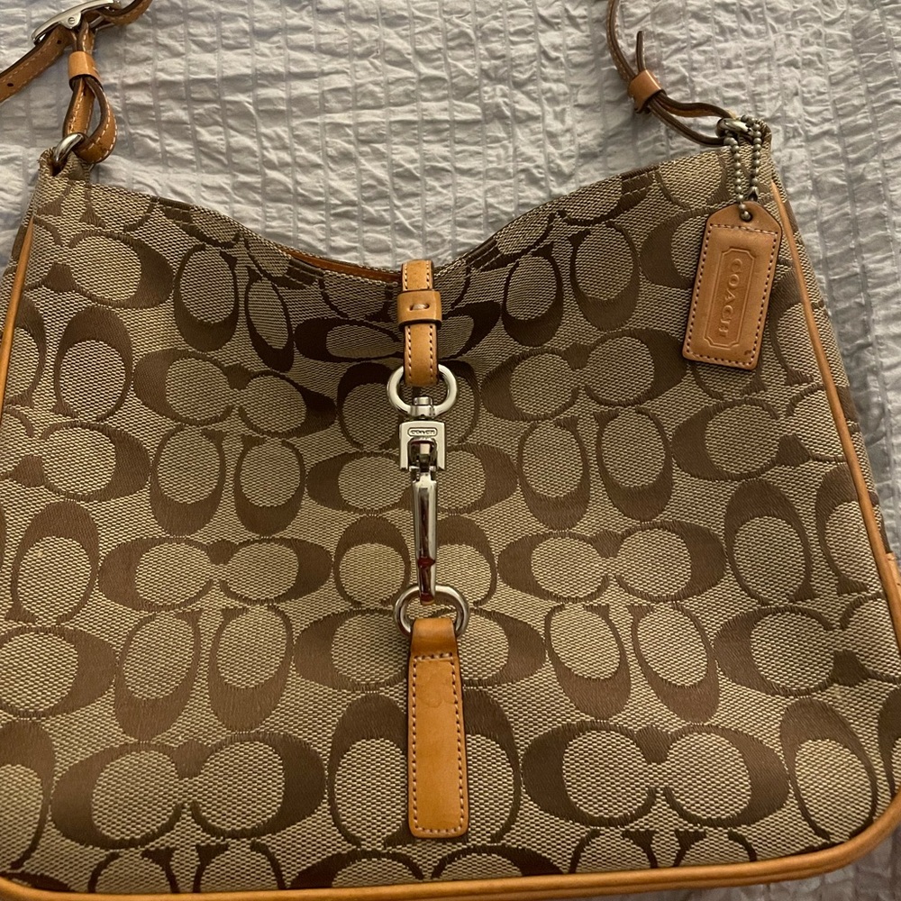 Coach shoulder bag.  Tan with C’s.
